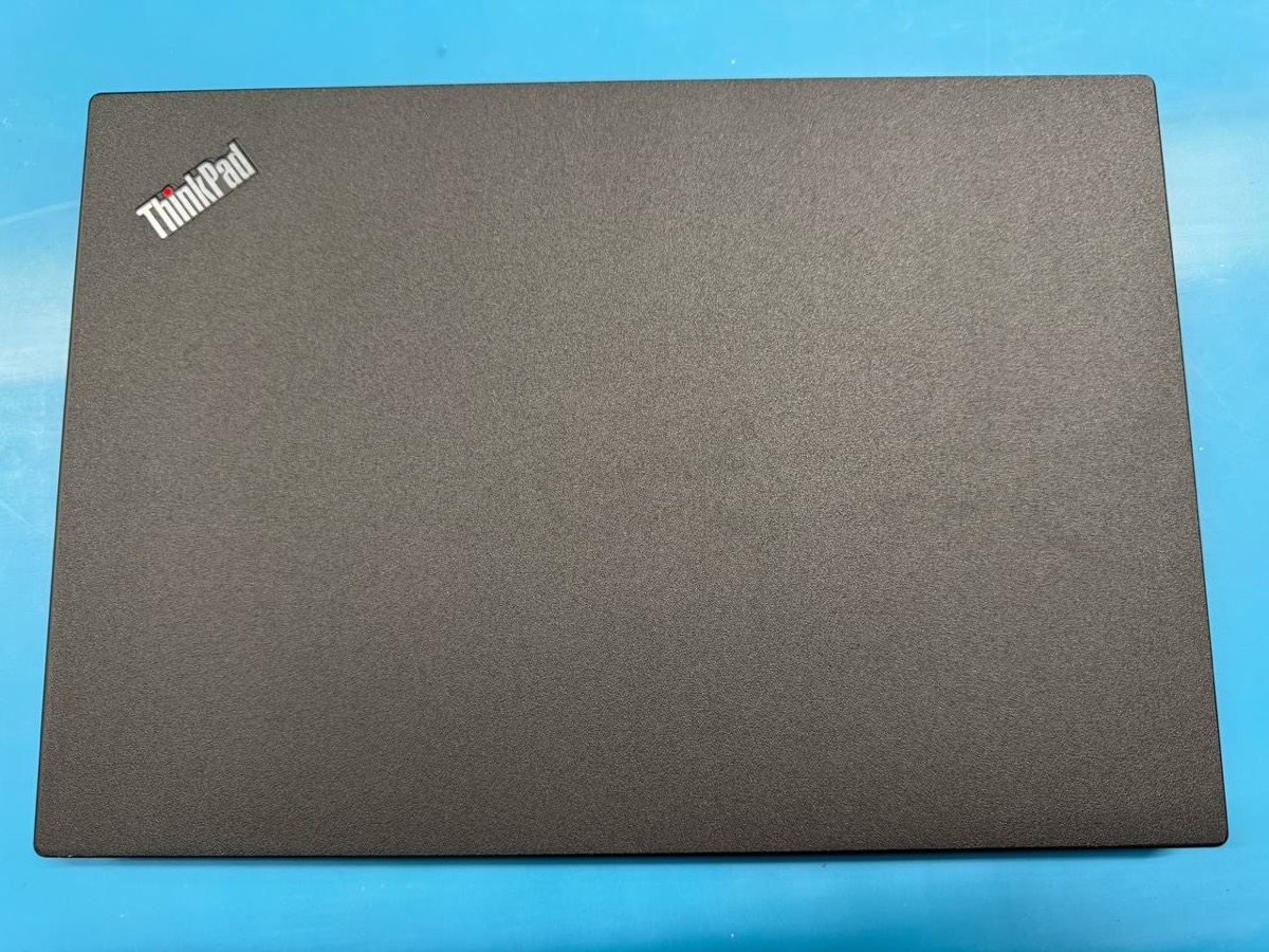 The same laptop with a like-new finish after cosmetic refurbishment