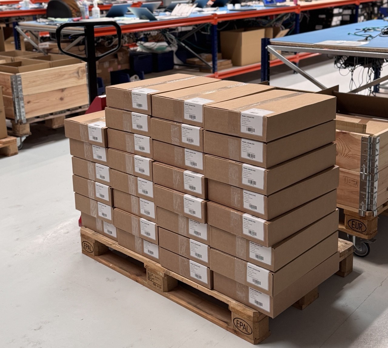 A full pallet of processed, labelled devices ready to ship from Scandic IT